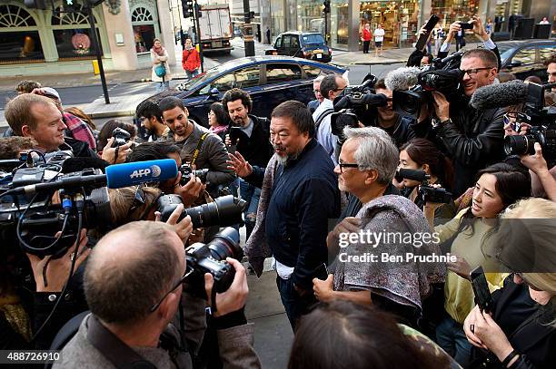 Ai Weiwei and Anish Kapoor speak to the media as they depart the Royal Academy as they walk through the city as part of a march in solidarity with...