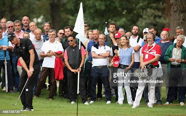Nicolas Colsaerts of Belgium plays his fourth shot on the ninth hole during the first round of the 72nd Open d'Italia at Golf Club Milano on...