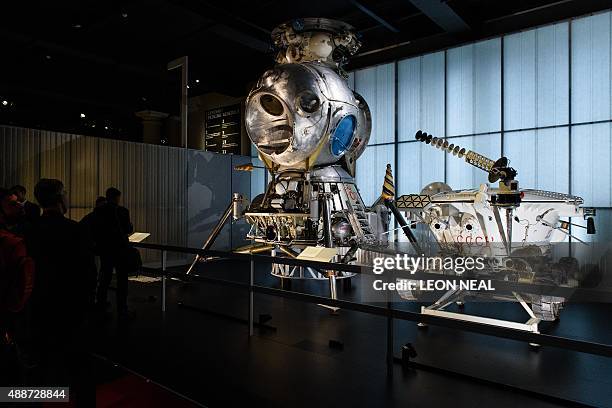 The LK-3 lunar lander from 1969 and the Lunokhod 1 lunar roving vehicle from 1970 are displayed in London on September 17 during a press preview for...