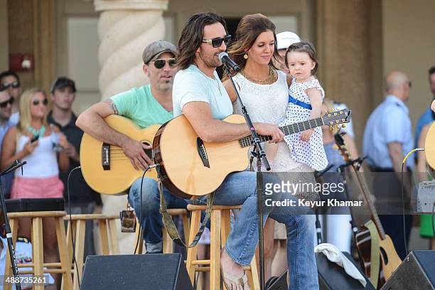 Recording artist Jake Owen introduces his wife Lacey Buchanan and their daughter Olive Pearl in concert during THE PLAYERS Championship Military...