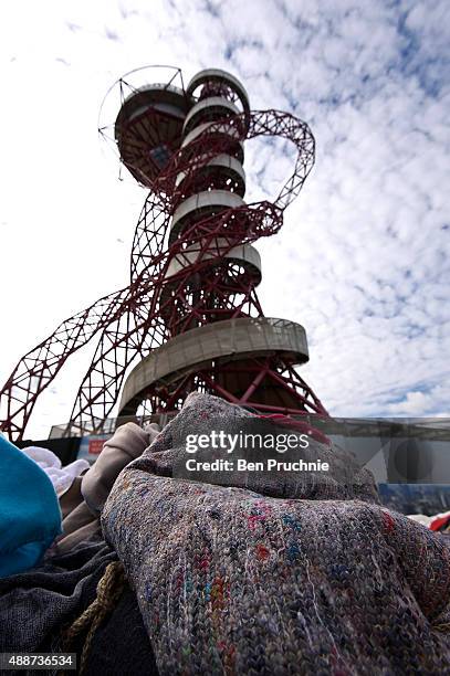 Blankets are placed at the bottom of the Arcelor Mittal Orbit after Anish Kapoor and Ai Weiwei walked through the city as part of a march in...