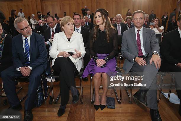 Queen Rania of Jordan schats with German Chancellor Angela Merkel as Walther Rathenau Institute Chairman Werner Hoyer and German politician Christian...