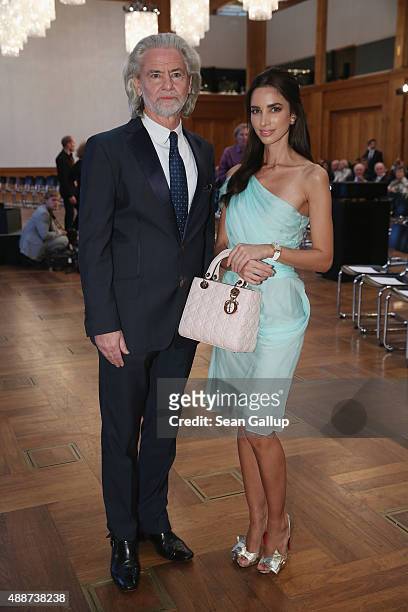 Lambertz confectionaries head Hermann Buehlbecker and friend Melissa Melita attend the Walther Rathenau Award ceremony on September 17, 2015 in...