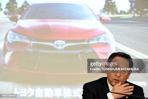 Toyota Motors president Akio Toyoda answers a question as he announces the company's financial results at their Tokyo headquarters on May 8, 2014....