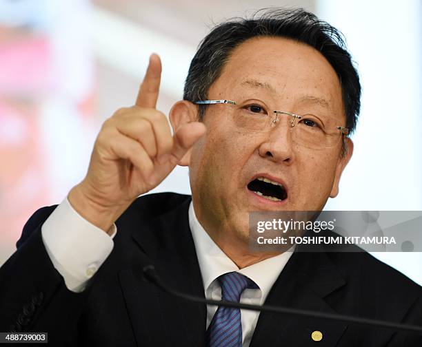 Toyota Motors president Akio Toyoda answers a question as he announces the company's financial results at their Tokyo headquarters on May 8, 2014....