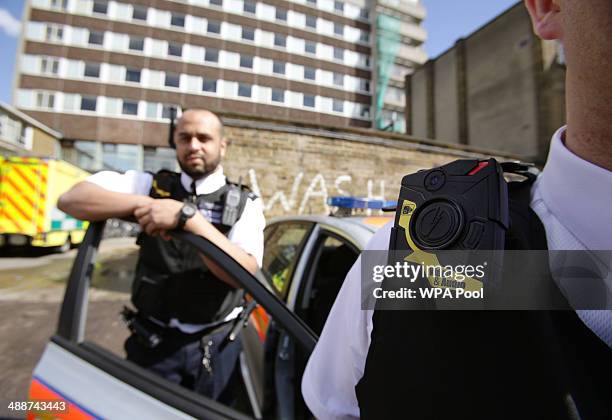 Constable Yasa Amerat and Constable Craig Pearson wearing their body-worn video cameras, ahead of a year-long pilot scheme by the Metropolitan...