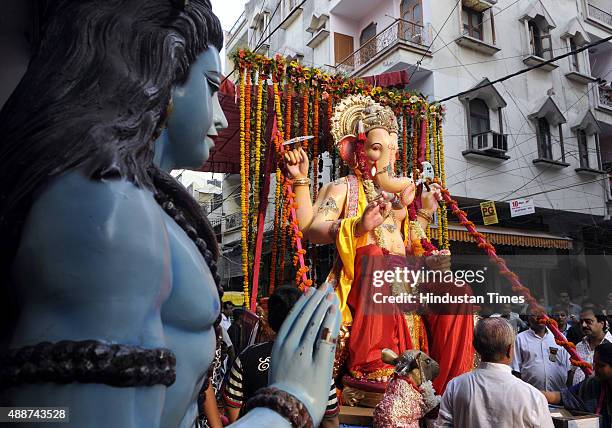 Lord Ganesha's idol during the procession before the installation at Laxmi Nagar on September 17, 2015 in New Delhi, India. Hindu festival Ganesha...