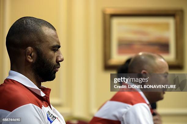 Japan's back row and captain Michael Leitch and head coach Eddie Jones deliver a press conference at the Hilton Hotel in Brighton, on September 17 to...