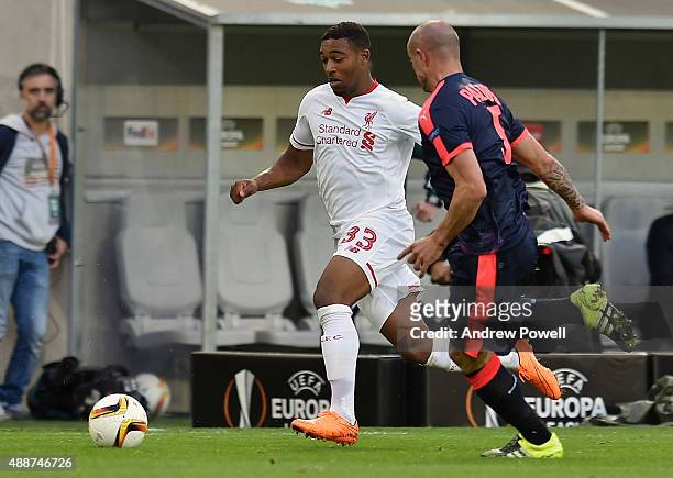 Jordon Ibe of Liverpool competes with Nicolas Pallois of FC Girondins de Bordeaux during the UEFA Europa League match between FC Girondins de...