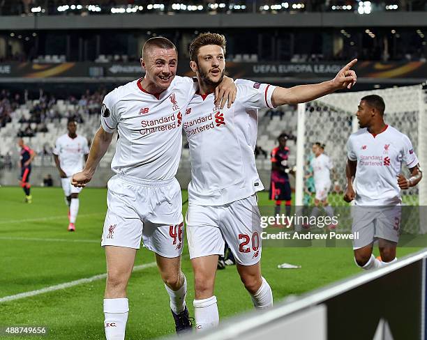 Adam Lallana of Liverpool celebrates after scoring the opening goal during the UEFA Europa League match between FC Girondins de Bordeaux and...