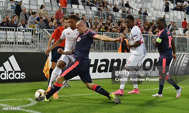 Jordon Ibe of Liverpool competes with Nicolas Pallois of FC Girondins de Bordeaux during the UEFA Europa League match between FC Girondins de...