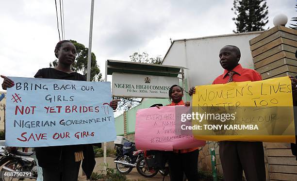 Dozens of people protest on May 8, 2014 in front of the Nigerian High Commission in Nairobi, urging the return of more than 200 schoolgirls abducted...