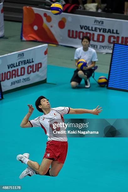 Yuta Yoneyama of Japan serves the ball in the match against Venezuela during the FIVB Men's Volleyball World Cup Japan 2015 at the Osaka Municipal...