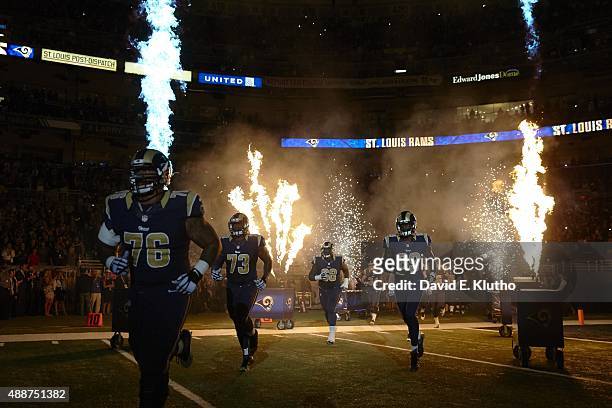 St. Louis Rams Rodger Saffold , Greg Robinson , Jared Cook , Jamon Brown , and teammates exiting tunnel onto field before game vs Seattle Seahawks at...