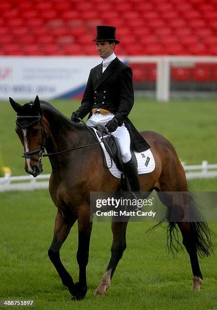 Harry Meade of Great Britain rides Wild Lone during the dressage section of the Badminton Horse Trials on May 8, 2014 in Badminton, Gloucestershire.