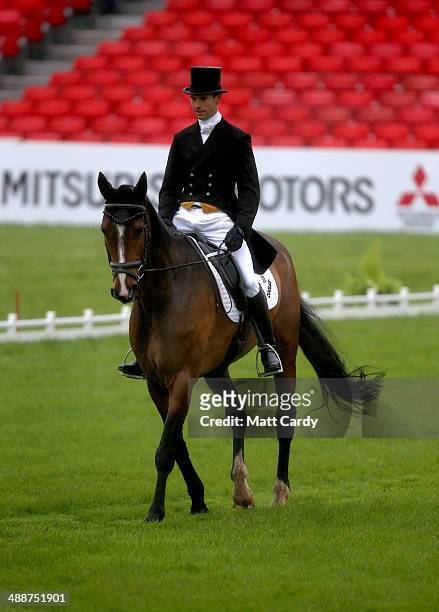 Harry Meade of Great Britain rides Wild Lone during the dressage section of the Badminton Horse Trials on May 8, 2014 in Badminton, Gloucestershire.