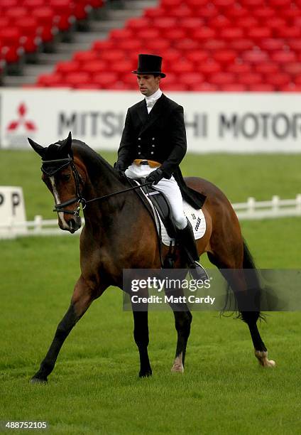 Harry Meade of Great Britain rides Wild Lone during the dressage section of the Badminton Horse Trials on May 8, 2014 in Badminton, Gloucestershire.