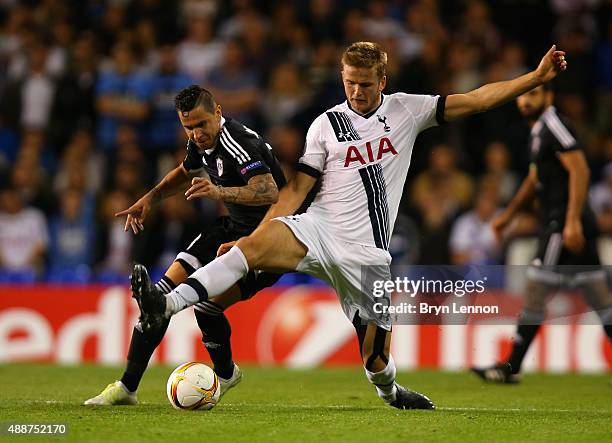 Reynaldo of FK Qarabag and Eric Dier of Tottenham Hotspur tussle for the ball during the UEFA Europa League Group J match between Tottenham Hotspur...