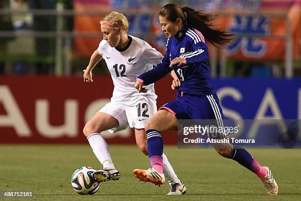 Homare Sawa of Japan and Betsy Hassett of New Zealand in action during the women's international friendly match between Japan and New Zealand at...