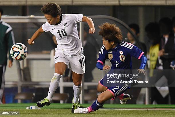 Saori Ariyoshi of Japan and Sarah Gregorius of New Zealand in action during the women's international friendly match between Japan and New Zealand at...