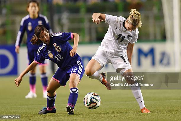 Emi Nakajima of Japan and Kirsty Yallop of New Zealand in action during the women's international friendly match between Japan and New Zealand at...