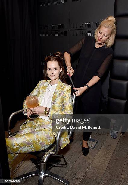 Charlotte De Carle attends the Launch of GHD S&M Pop Up Studio for London Fashion Week on September 17, 2015 in London, England.