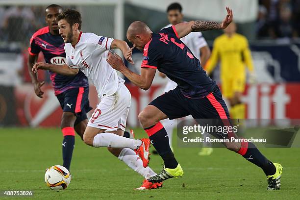 Adama Lallana for Liverpool FC and Nicolas Pallois in action during the Europa League game between FC Girondins de Bordeaux and Liverpool FC at...