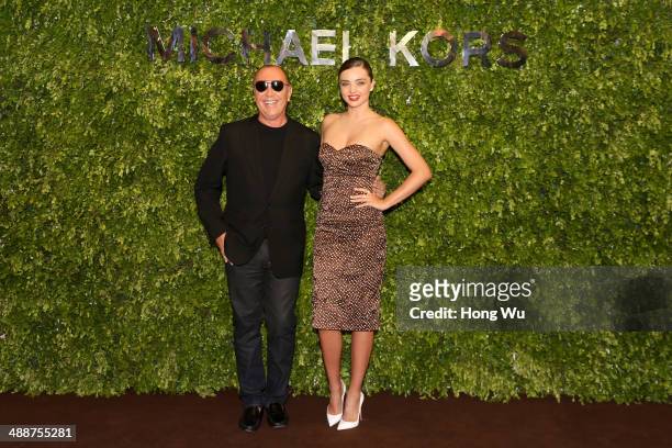 Michael kors and Miranda Kerr attend the Michael Kors Kerry Centre Flagship Store opening ceremony on May 8, 2014 in Shanghai, China.
