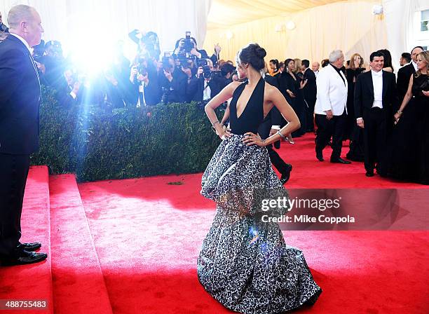 Designer Michael Kors and Zoe Saldana attend the "Charles James: Beyond Fashion" Costume Institute Gala at the Metropolitan Museum of Art on May 5,...