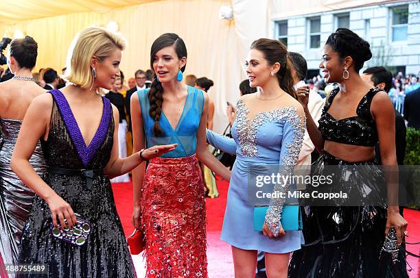 Dianna Agron, Stacy Martin, Elizabeth Olsen and Gabrielle Union attend the "Charles James: Beyond Fashion" Costume Institute Gala at the Metropolitan...