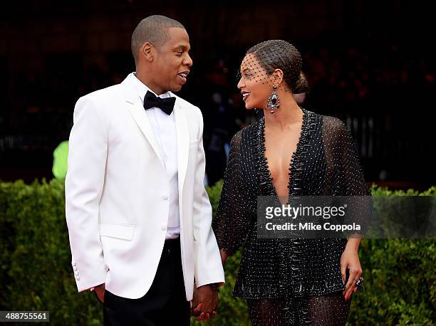Jay-Z and Beyonce attend the "Charles James: Beyond Fashion" Costume Institute Gala at the Metropolitan Museum of Art on May 5, 2014 in New York City.