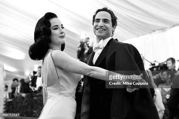 Dita Von Teese and Designer Zac Posen attend the "Charles James: Beyond Fashion" Costume Institute Gala at the Metropolitan Museum of Art on May 5,...