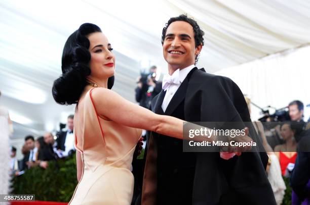 Dita Von Teese and Designer Zac Posen attend the "Charles James: Beyond Fashion" Costume Institute Gala at the Metropolitan Museum of Art on May 5,...