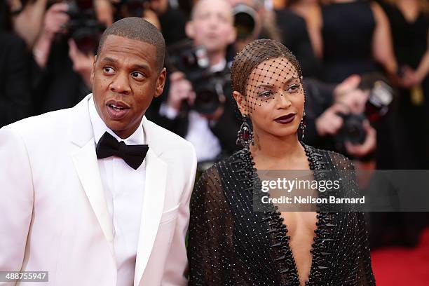 Beyonce and Jay-Z attend the "Charles James: Beyond Fashion" Costume Institute Gala at the Metropolitan Museum of Art on May 5, 2014 in New York City.