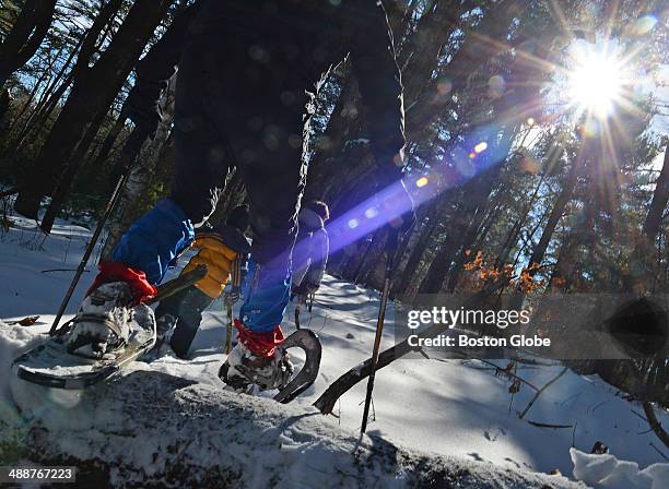 Writer Jay Jay Atkinson and his two nephews Shane Bauer and Owen Bower enjoy a day of snowshoeing at the Methuen Town Forest on February 8, 2014.