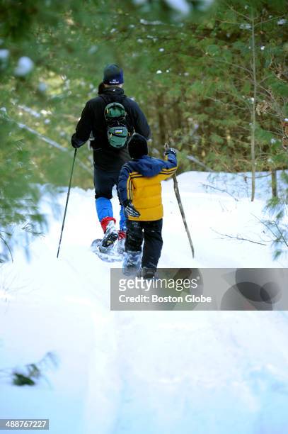 Writer Jay Jay Atkinson and his two nephews Shane Bauer and Owen Bower not pictured, enjoy a day of snowshoeing at the Methuen Town Forest on...