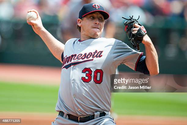 Starting pitcher Kevin Correia of the Minnesota Twins pitches during the first inning against the Cleveland Indians at Progressive Field on May 8,...
