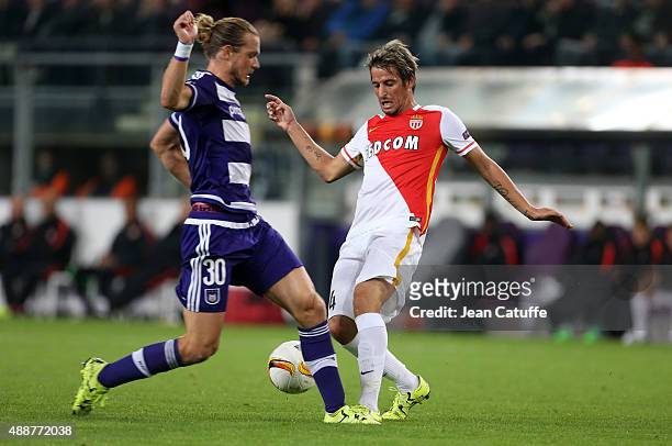Guillaume Gillet of Anderlecht and Fabio Coentrao of Monaco in action during the UEFA Europa League match between RSC Anderlecht and AS Monaco FC at...