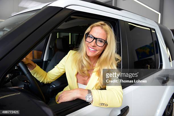 Project ambassador Sonya Kraus poses in a Landrover on May 8, 2014 in Frankfurt am Main, Germany. German charity 'Childaid Network' and Land Rover...
