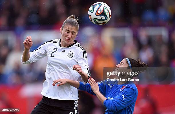 Bianca Schmidt of Germany goes up for a header with Lucia Suskova of Slovakia during the FIFA Women's World Cup 2015 Qualifier between Germany and...