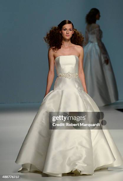 Model walks the runway for the latest bridal collection by Cymbeline during 'Barcelona Bridal Week 2014' on May 8, 2014 in Barcelona, Spain.