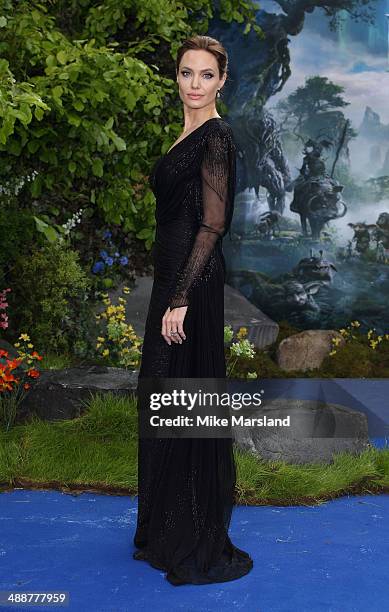 Angelina Jolie attends a private reception as costumes and props from Disney's "Maleficent" are exhibited in support of Great Ormond Street Hospital...