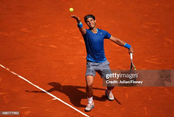 Rafael Nadal of Spain in action against Jarkko Nieminen of Finland during day six of the Mutua Madrid Open tennis tournament at the Caja Magica on...