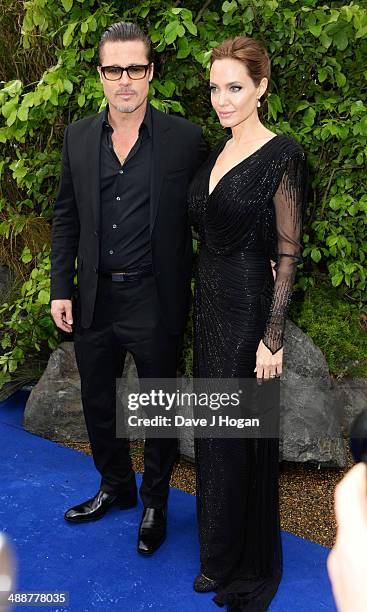 Brad Pitt and Angelina Jolie attend the 'Maleficent' Costume And Props Private Reception at Kensington Palace on May 8, 2014 in London, England.