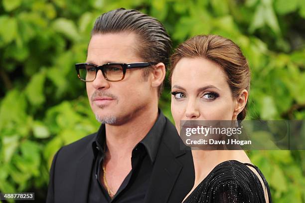 Brad Pitt and Angelina Jolie attend the 'Maleficent' Costume And Props Private Reception at Kensington Palace on May 8, 2014 in London, England.