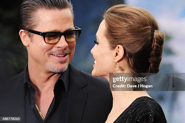 Brad Pitt and Angelina Jolie attend the 'Maleficent' Costume And Props Private Reception at Kensington Palace on May 8, 2014 in London, England.