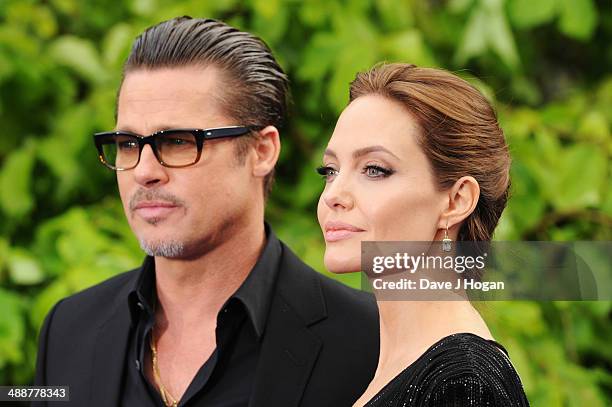 Brad Pitt and Angelina Jolie attend the 'Maleficent' Costume And Props Private Reception at Kensington Palace on May 8, 2014 in London, England.