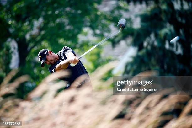 Jason Day of Australia plays his shot from the fourth tee during the First Round of the BMW Championship at Conway Farms Golf Club on September 17,...