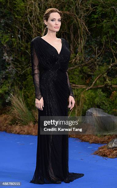 Angelina Jolie attends a private reception as costumes and props from Disney's "Maleficent" are exhibited in support of Great Ormond Street Hospital...