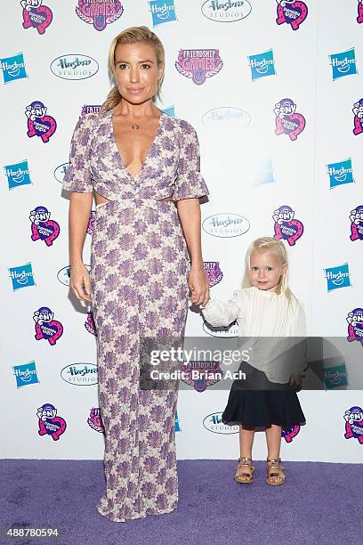 Tracy Anderson and daughter Penelope Mogol arrive at the My Little Pony Equestria Girls Friendship Games premiere September 17, 2015 at the Angelika...